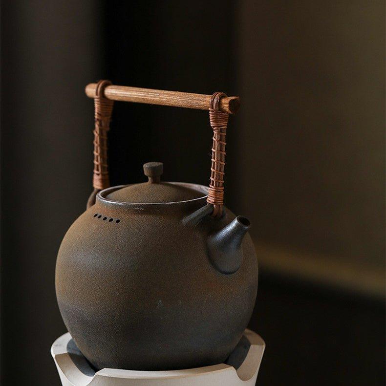 Handcrafted Ceramic Ball Shaped Boiler With Rattan Handle